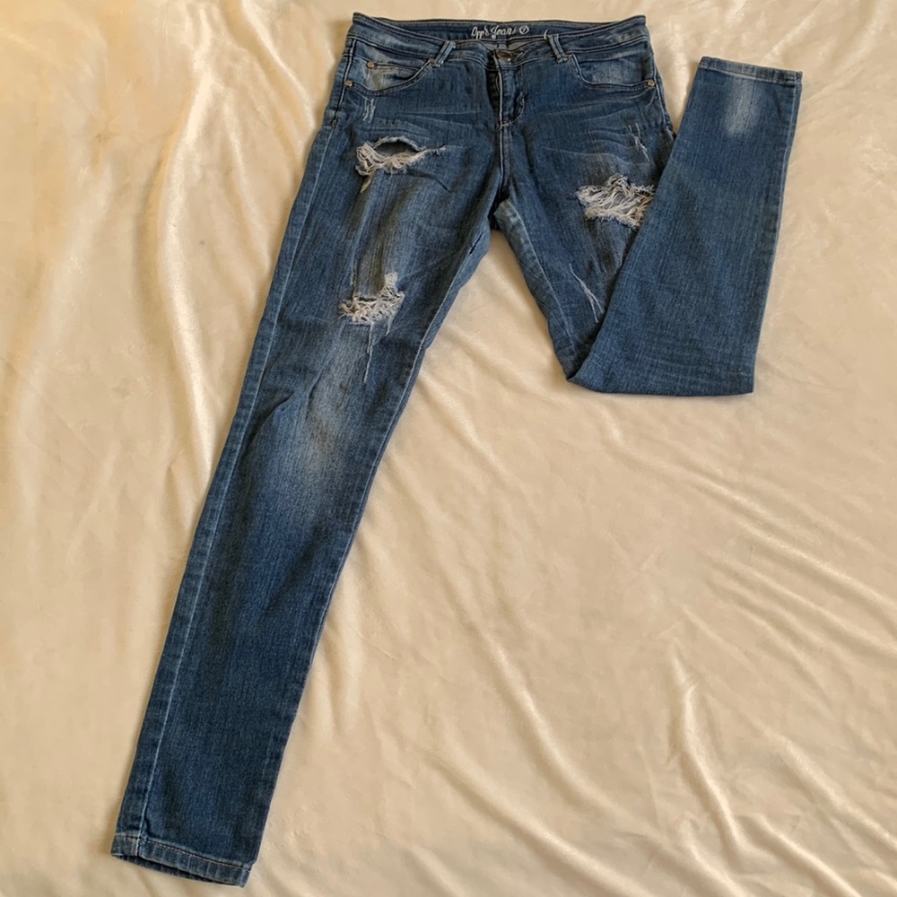 Ripped skinny denim jeans.